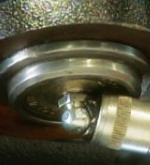 greasing-procedure-steering-suspension-parts Mechanic working on suspension.