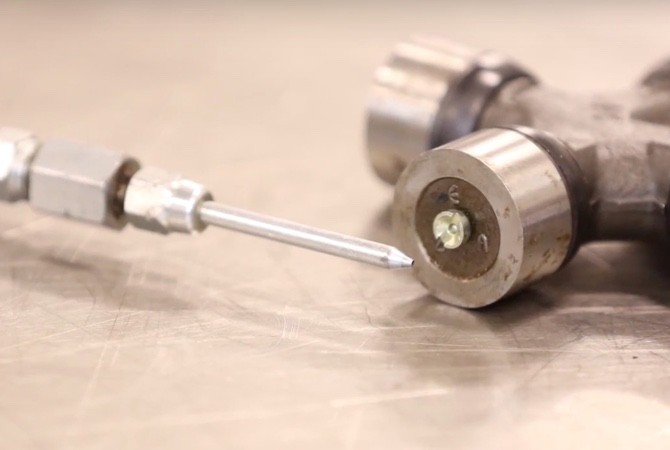 needle-nose-adapter-for-greasing-chassis-parts Needle nose adapter for greasing chassis parts.