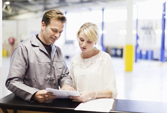 Mechanic-Consulting-With-Customer Mechanic-Consulting-With-Customer