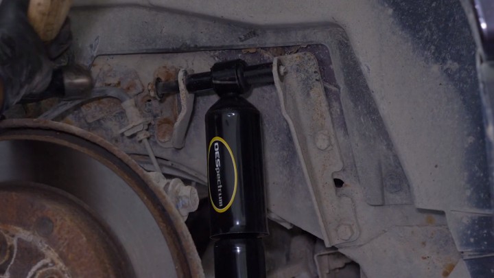 Installing new shock on the vehicle Installing new shock on the vehicle