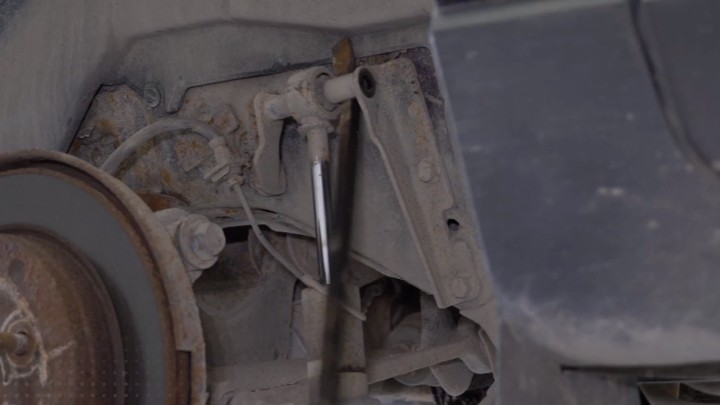 Removing old shock from the vehicle Removing old shock from the vehicle