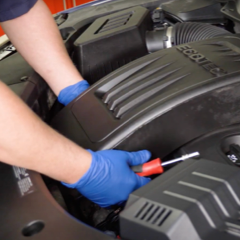 step-1-technician-removing-cold-air-intake step-1-technician-removing-cold-air-intake