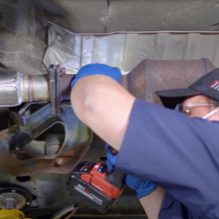 step-13-technician-completing-catalytic-converter-installation step-13-technician-completing-catalytic-converter-installation