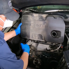 step-16-technician-reinstalling-engine-cover-cold-air-intake step-16-technician-reinstalling-engine-cover-cold-air-intake